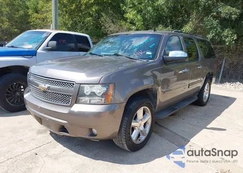 2011 Chevrolet Suburban 1500 Ls z USA, uszkodzony, nr VIN 1GNSKHE32BR392103